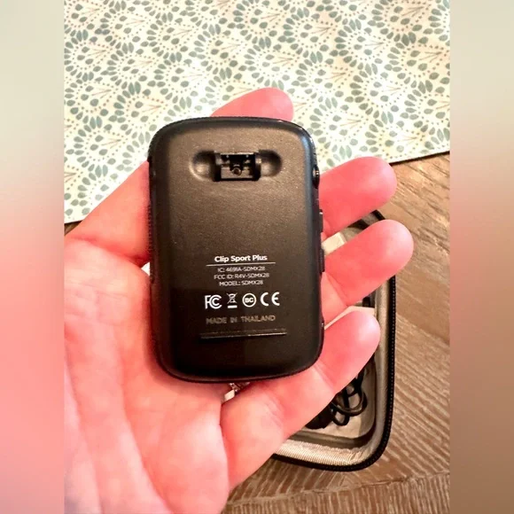 San disk MP3 player and case. Great condition except clip broke on back